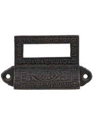 Egg and Dart Cast-Iron Bin Pull with Label Holder in Antique Iron.